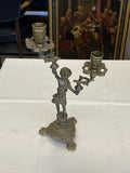 Zweiarmiger Kerzenleuchter mit Putto, antik, 31 cm