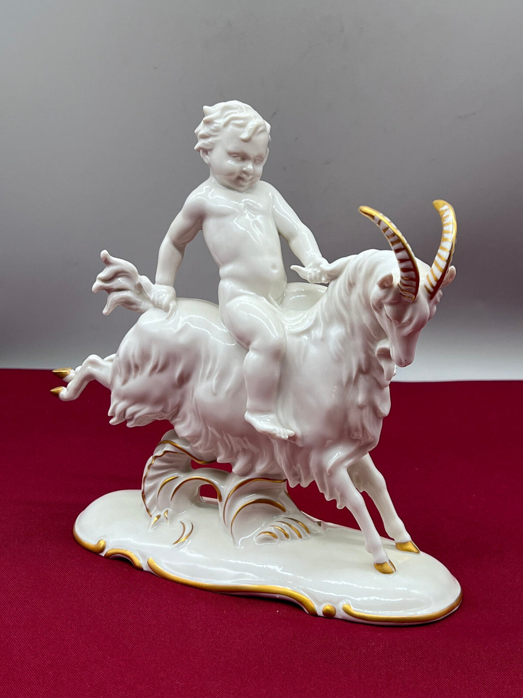 PORZELLAN FIGUR PUTTO AUF ZIEGENBOCK VOLKSTEDT ENTWURF HUGO MEISEL
